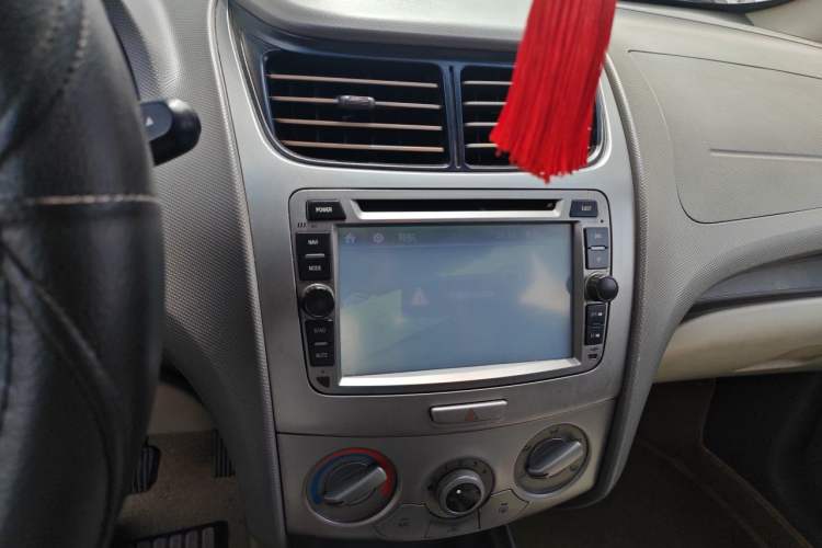Used Chevrolet Sail 2013 Sedan 1.4L Manual Ideal Edition Audio And AC Panel