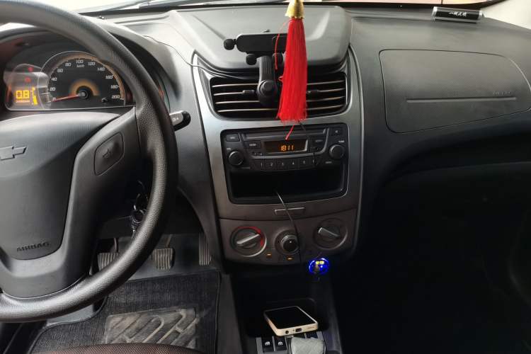 Used Chevrolet Sail 2013 Sedan 1.4L Manual Ideal Happiness Edition Audio And AC Panel