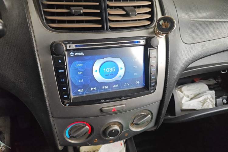 Used Chevrolet Sail 2013 Sedan 1.2L Manual Fashionable Happiness Edition Audio And AC Panel