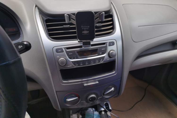 Used Chevrolet Sail 2013 Sedan 1.4L Manual Happiness Edition II Audio And AC Panel