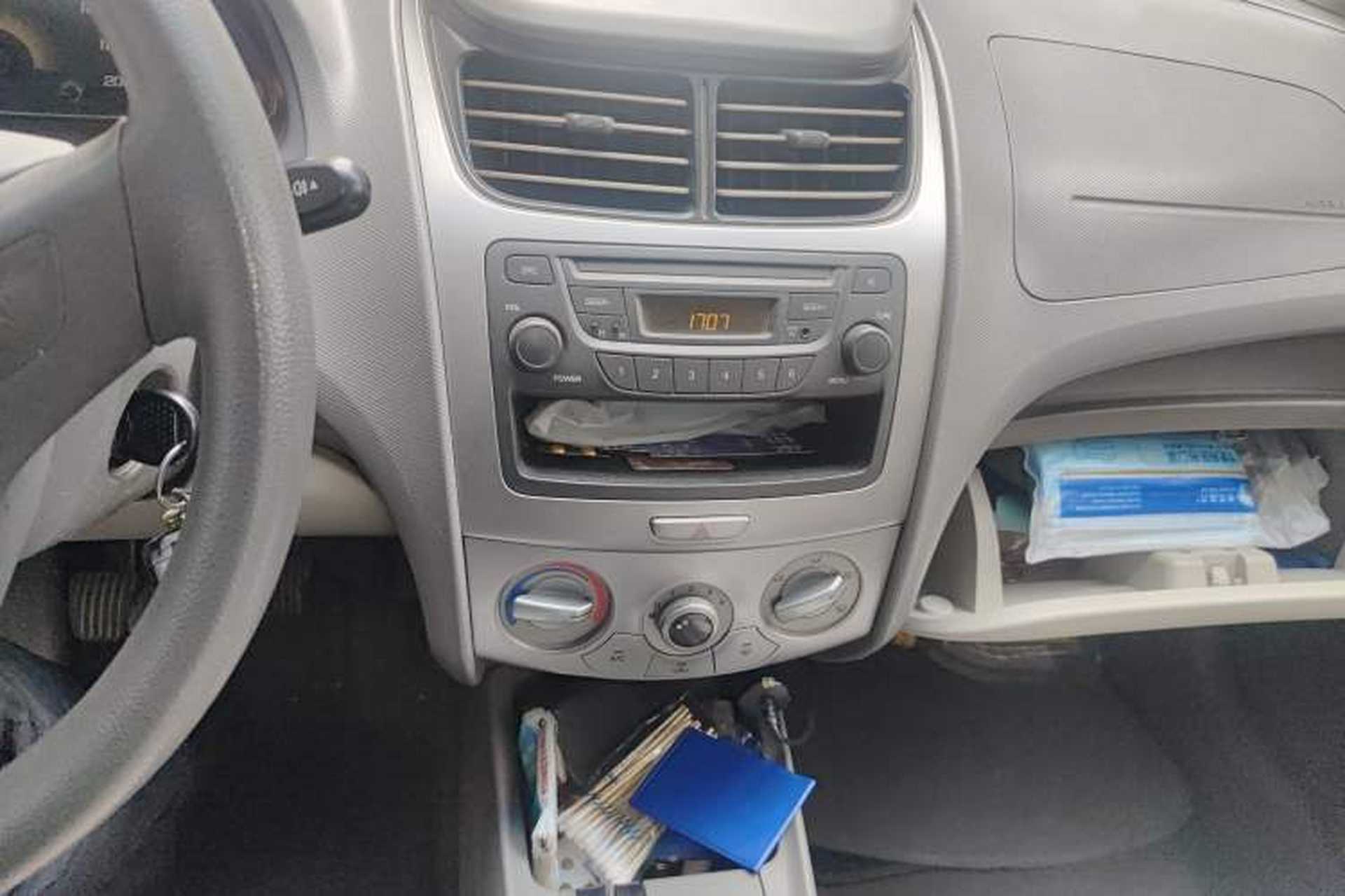 Used Chevrolet Sail 2013 Sedan 1.4L Manual Ideal Edition Audio And AC Panel
