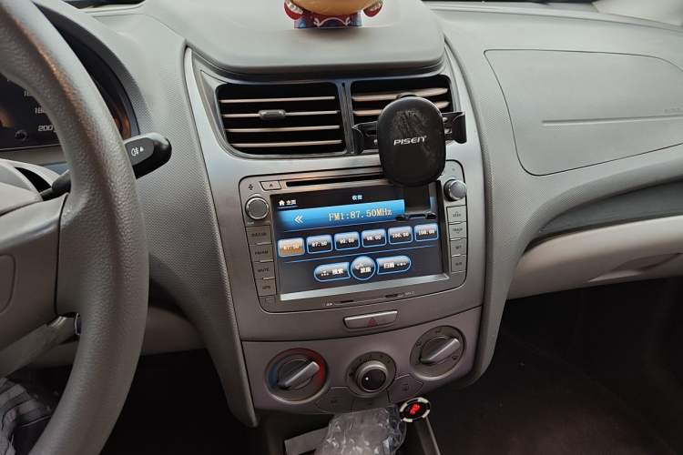 Used Chevrolet Sail 2013 Sedan 1.2L Manual Ideal Edition Audio And AC Panel