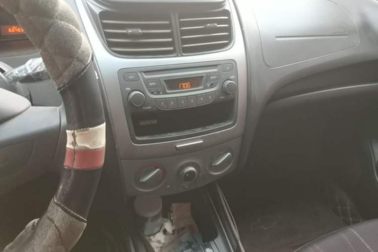 Used Chevrolet Sail 2013 Sedan 1.4L Manual Ideal Happiness Edition Audio And AC Panel