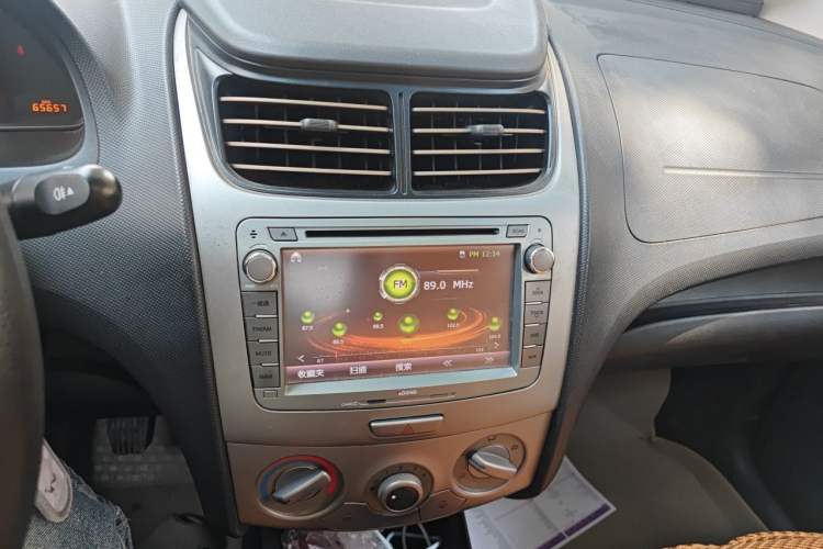 Used Chevrolet Sail 2013 Sedan 1.4L Manual Happiness Edition II Audio And AC Panel