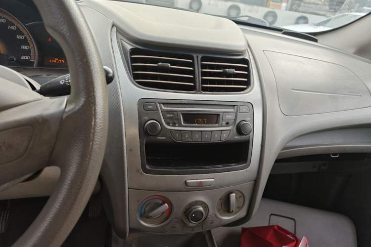 Used Chevrolet Sail 2013 Sedan 1.4L Manual Ideal Edition Audio And AC Panel