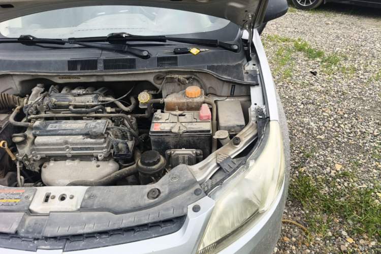 Used Chevrolet Sail 2013 Sedan 1.2L Manual Fashionable Happiness Edition Engine Bay Left