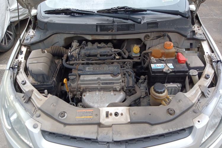 Used Chevrolet Sail 2013 Sedan 1.2L Manual Fashionable Happiness Edition Engine Bay