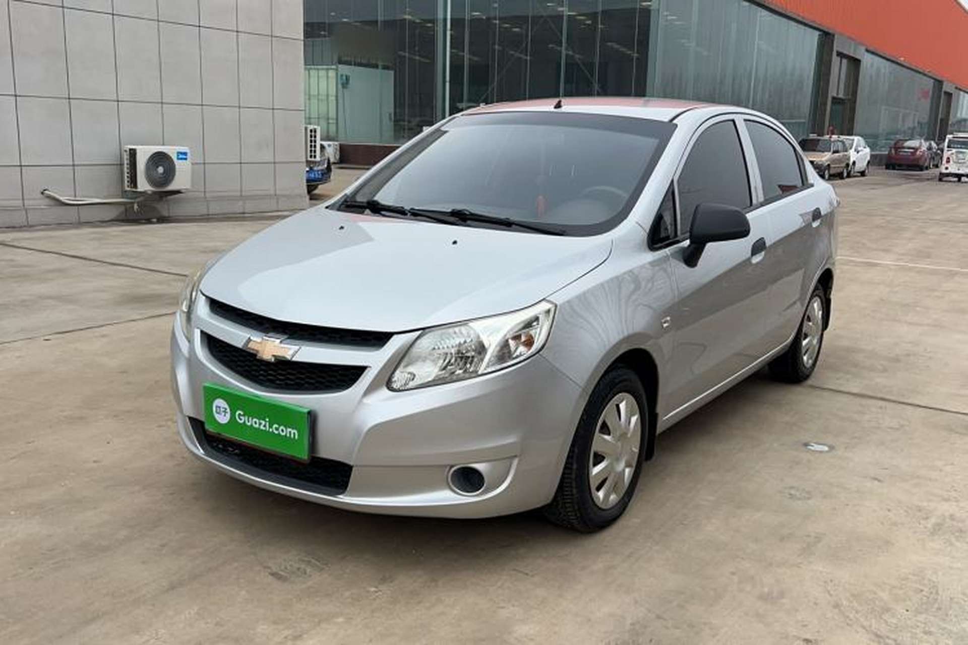 Used Chevrolet Sail 2013 Sedan 1.4L Manual Ideal Happiness Edition Front Left 45 Deg