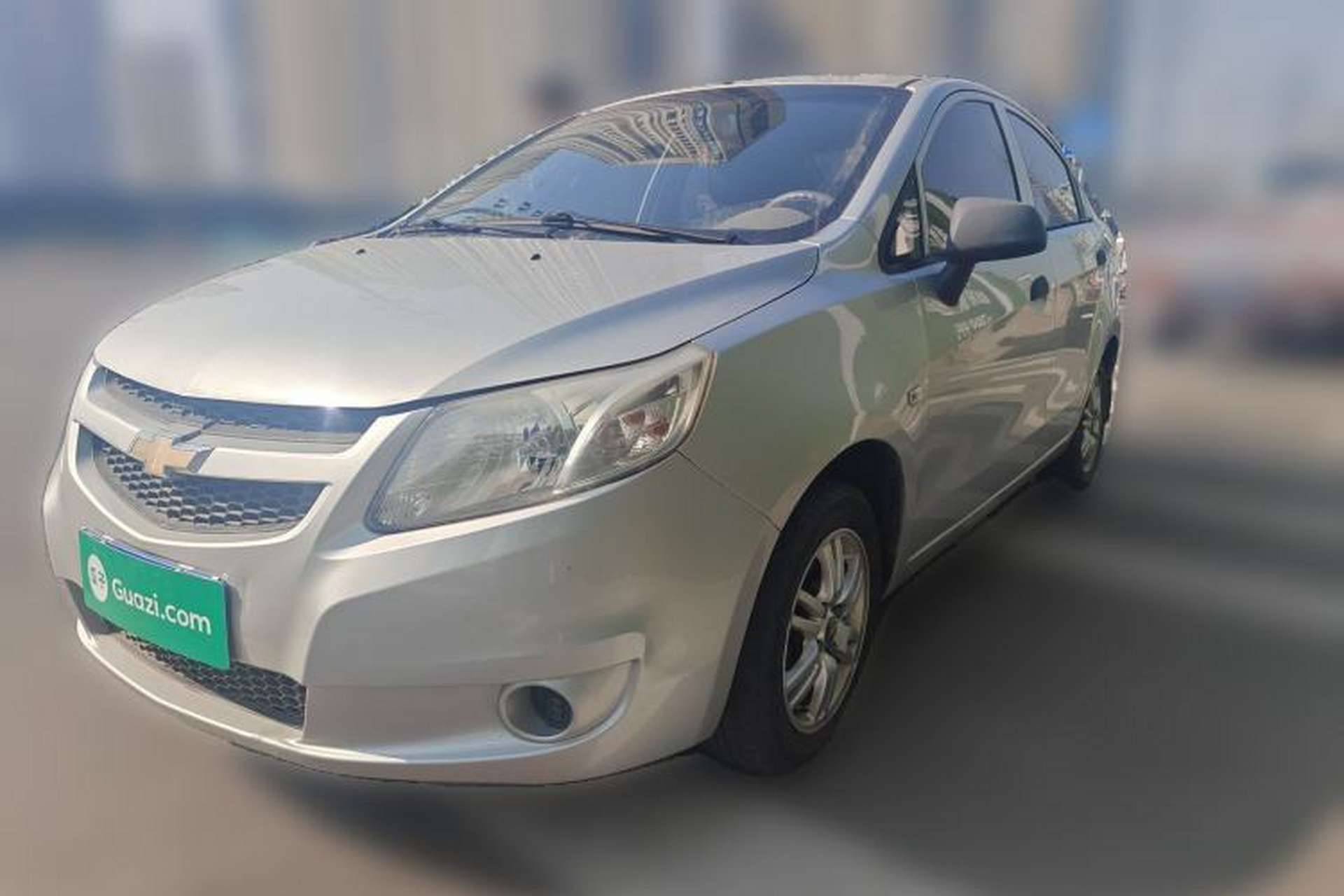 Used Chevrolet Sail 2013 Sedan 1.4L Manual Ideal Happiness Edition Front Left 45 Deg