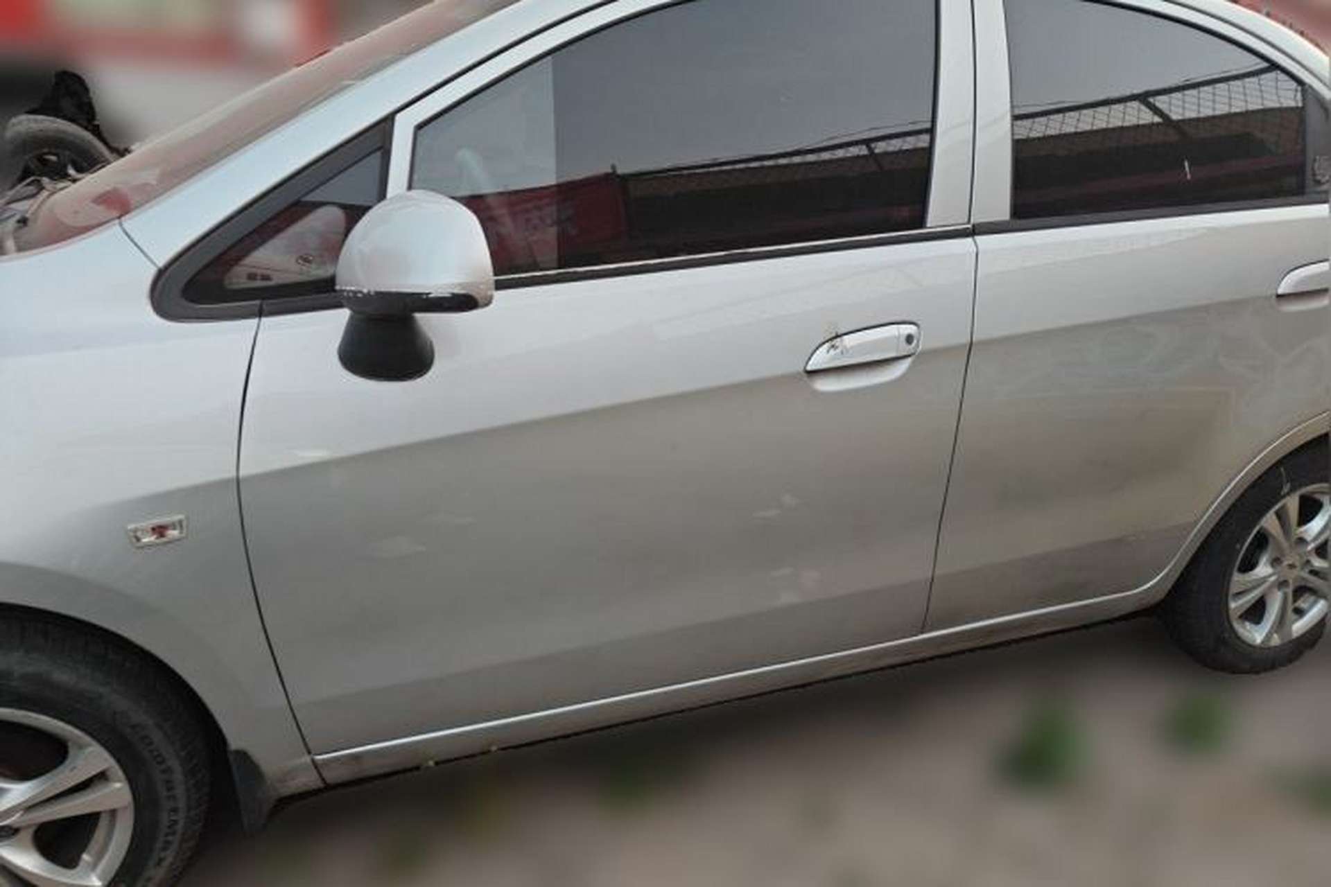 Used Chevrolet Sail 2013 Sedan 1.4L Manual Happiness Edition II Front Left 45 Deg