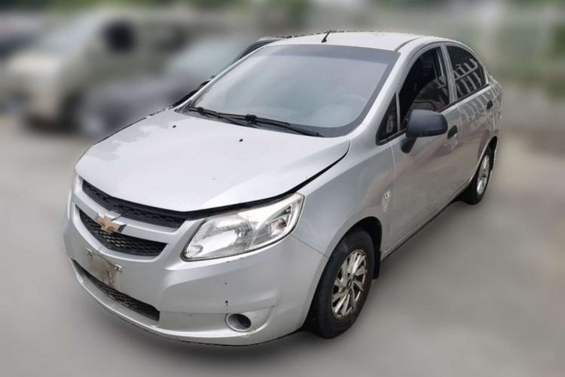Used Chevrolet Sail 2013 Sedan 1.2L Manual Fashionable Happiness Edition Front Left 45 Deg