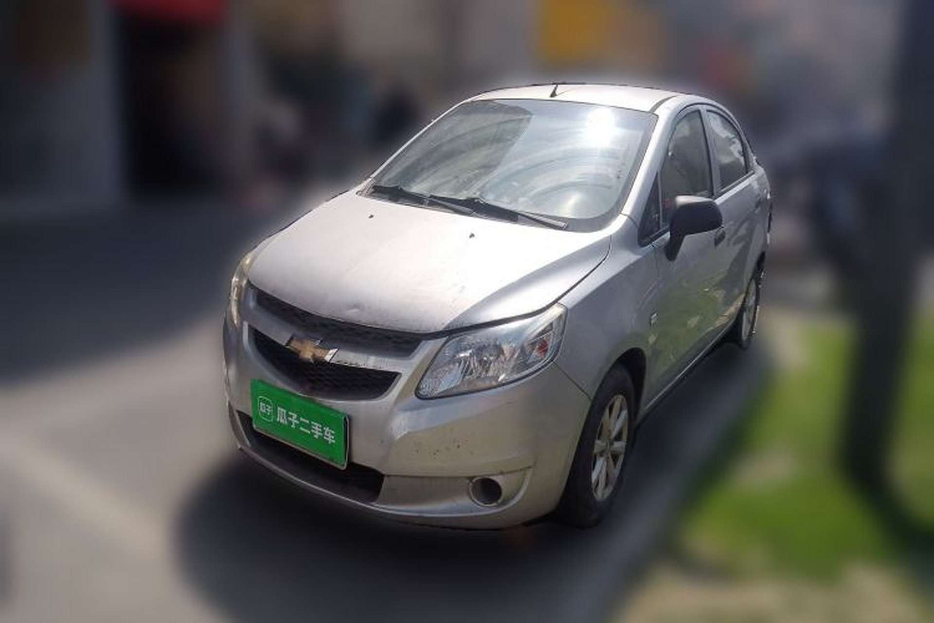 Used Chevrolet Sail 2013 Sedan 1.2L Manual Warm Edition Front Left 45 Deg