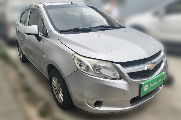 Used Chevrolet Sail 2013 Sedan 1.2L Manual Fashionable Happiness Edition Front Right 45 Deg