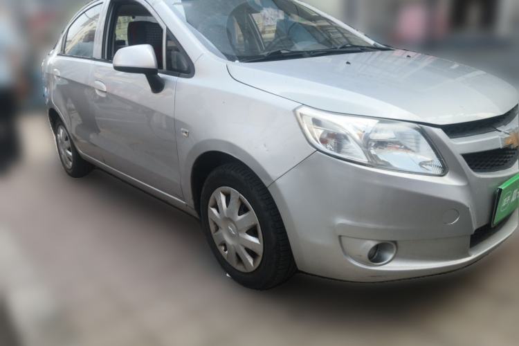 Used Chevrolet Sail 2013 Sedan 1.4L Manual Elegance Edition Front Right 45 Deg