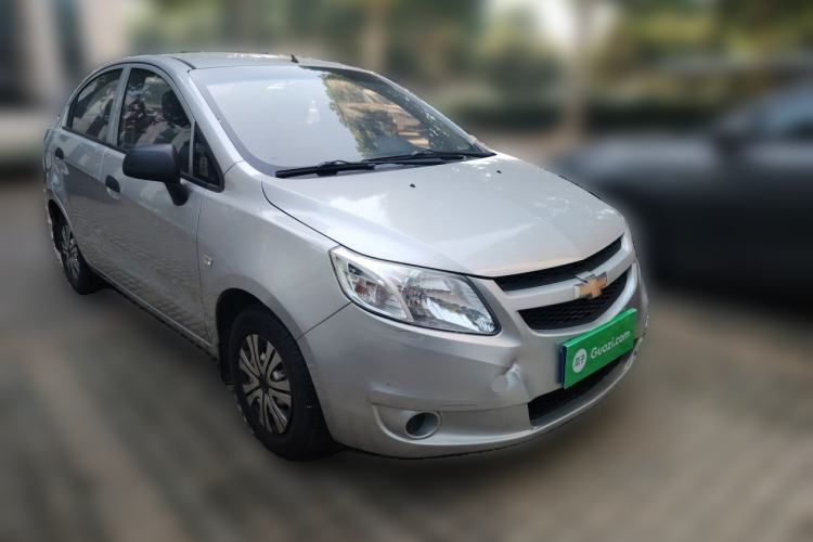 Used Chevrolet Sail 2013 Sedan 1.2L Manual Fashionable Happiness Edition Front Right 45 Deg