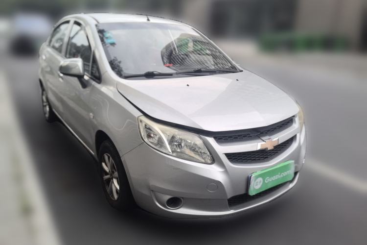 Used Chevrolet Sail 2013 Sedan 1.2L Manual Fashionable Happiness Edition Front Right 45 Deg