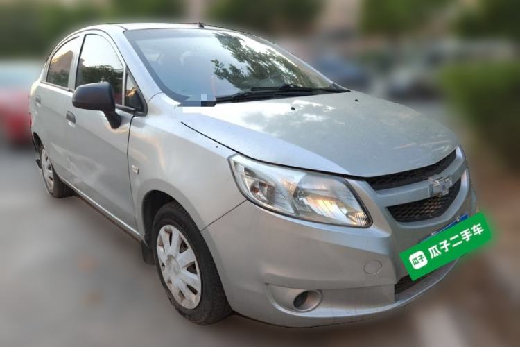 Used Chevrolet Sail 2013 Sedan 1.4L Manual Ideal Happiness Edition Front Right 45 Deg