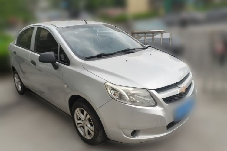 Used Chevrolet Sail 2013 Sedan 1.4L Manual Ideal Happiness Edition Front Right 45 Deg