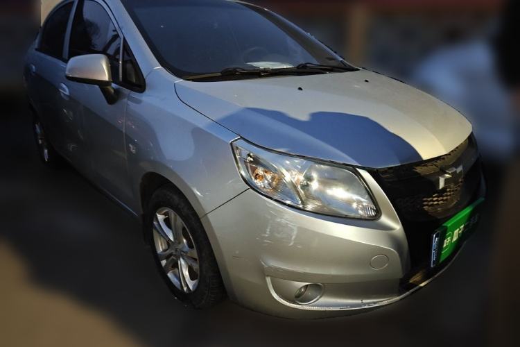 Used Chevrolet Sail 2013 Sedan 1.4L Manual Happiness Edition II Front Right 45 Deg