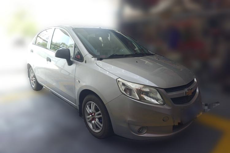Used Chevrolet Sail 2013 Sedan 1.4L Manual Ideal Edition Front Right 45 Deg