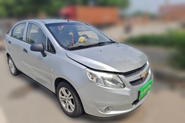 Used Chevrolet Sail 2013 Sedan 1.4L Manual Ideal Edition Front Right 45 Deg