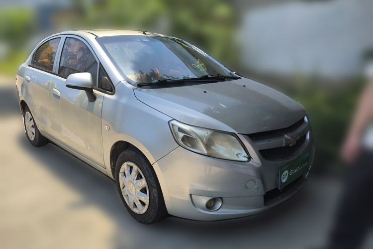 Used Chevrolet Sail 2013 Sedan 1.4L Manual Elegance Edition Front Right 45 Deg