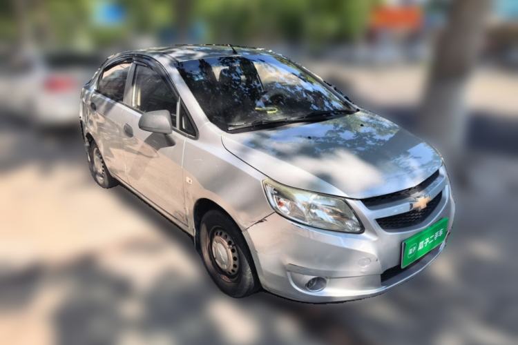 Used Chevrolet Sail 2013 Sedan 1.2L Manual Fashionable Happiness Edition Front Right 45 Deg