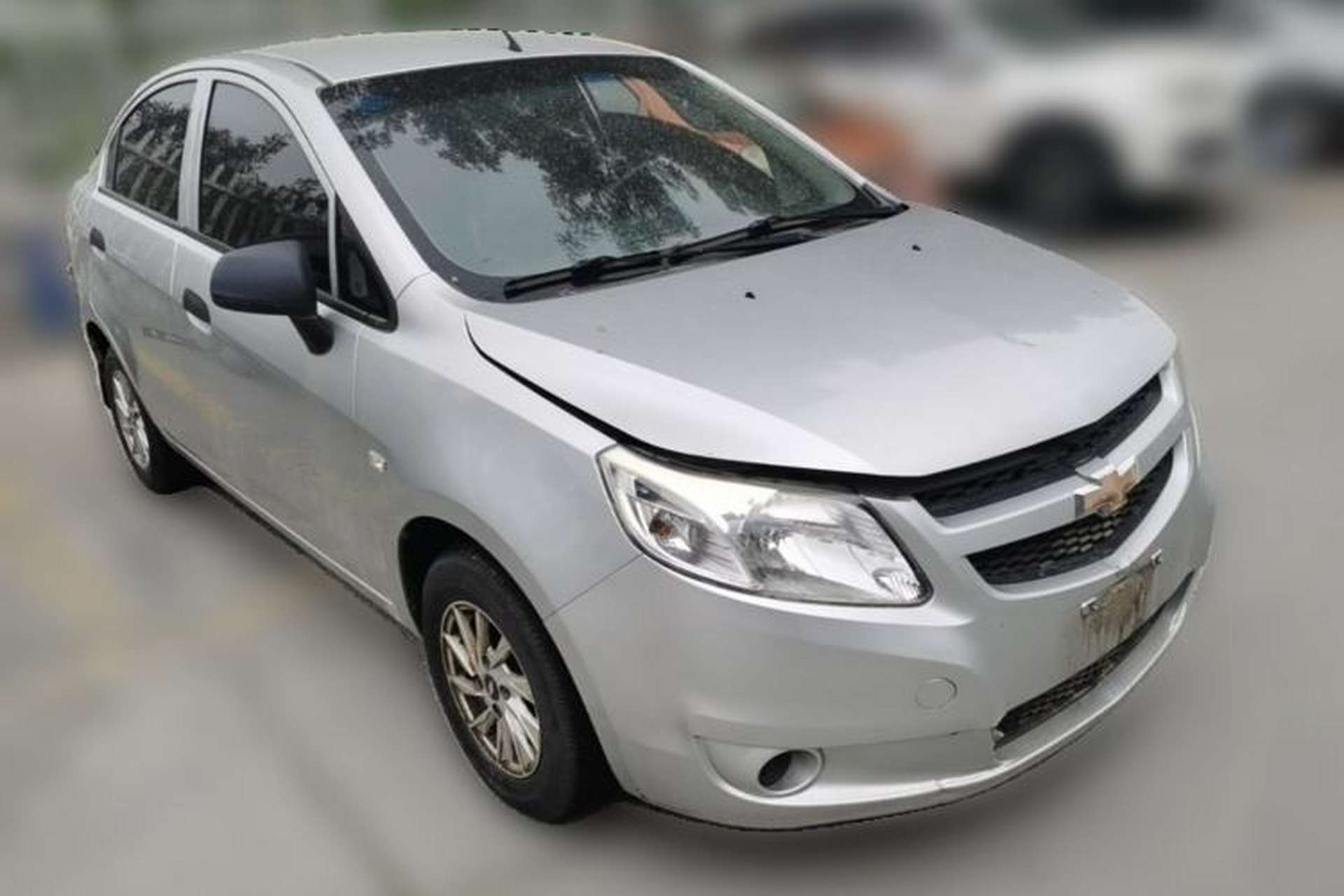 Used Chevrolet Sail 2013 Sedan 1.2L Manual Fashionable Happiness Edition Front Right 45 Deg
