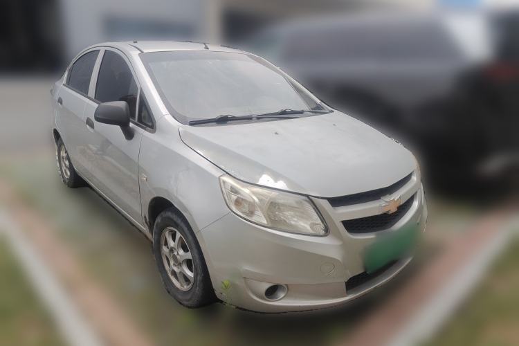 Used Chevrolet Sail 2013 Sedan 1.2L Manual Fashionable Happiness Edition Front Right 45 Deg