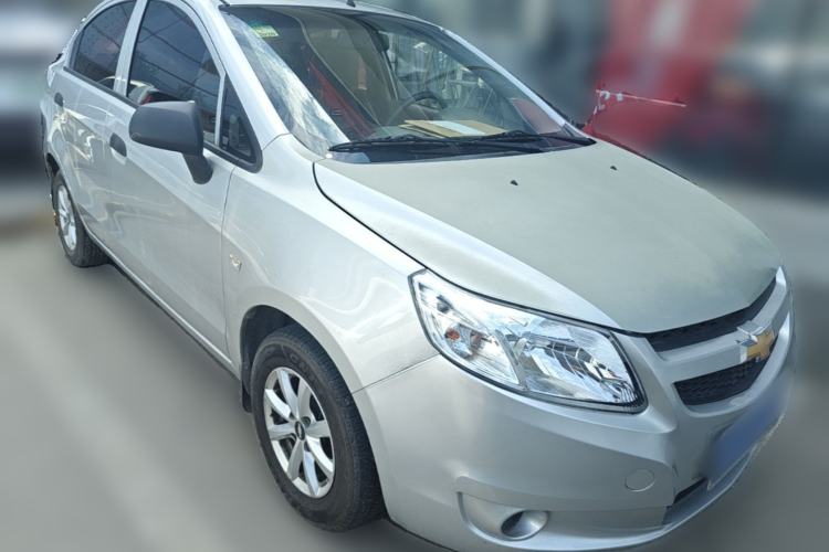 Used Chevrolet Sail 2013 Sedan 1.2L Manual Fashionable Happiness Edition Front Right 45 Deg
