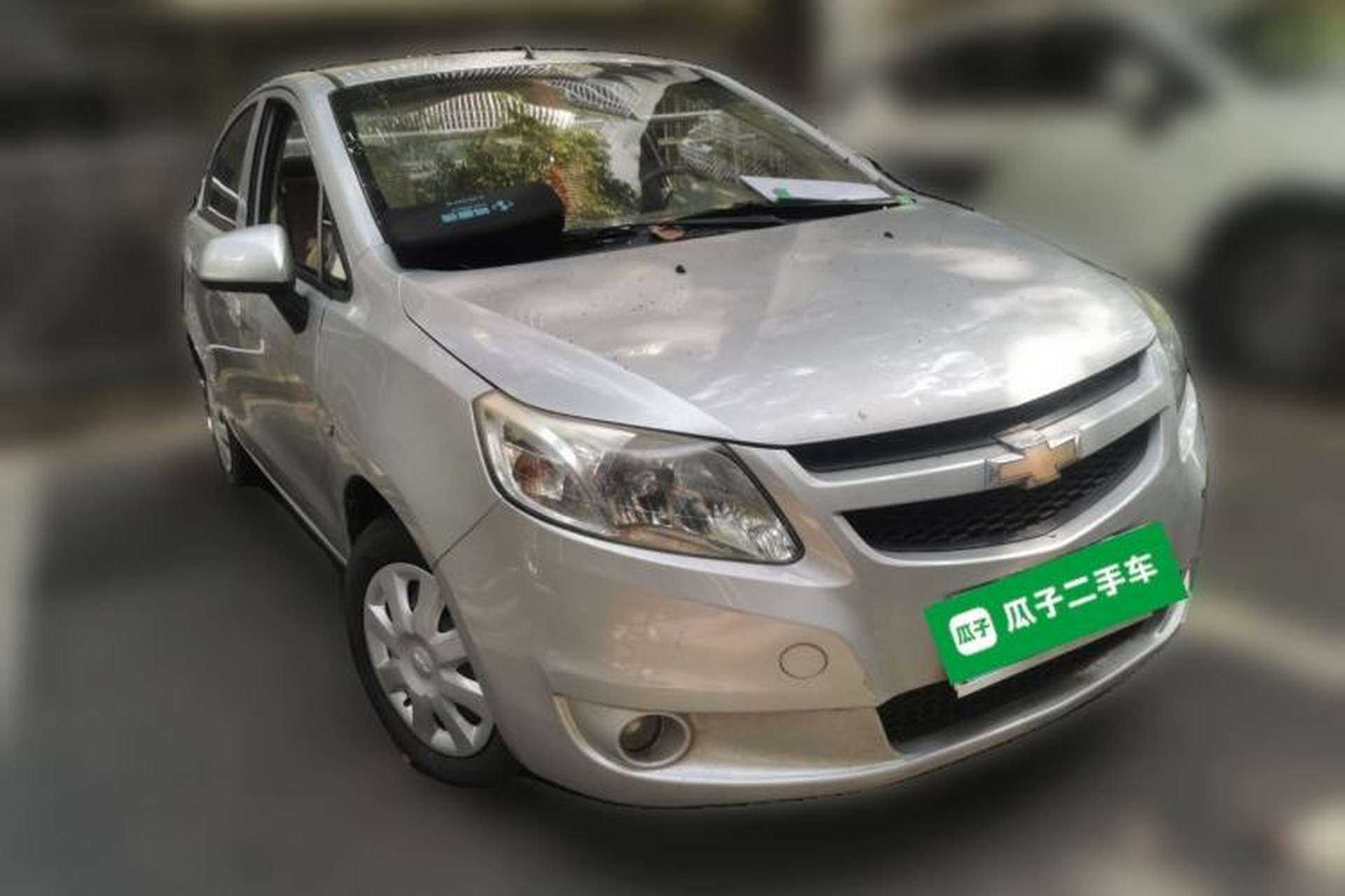 Used Chevrolet Sail 2013 Sedan 1.4L Manual Elegance Edition Front Right 45 Deg