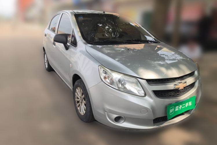 Used Chevrolet Sail 2013 Sedan 1.2L Manual Fashionable Happiness Edition Front Right 45 Deg