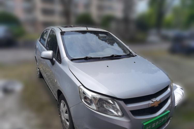 Used Chevrolet Sail 2013 Sedan 1.4L Manual Happiness Edition II Front Right 45 Deg
