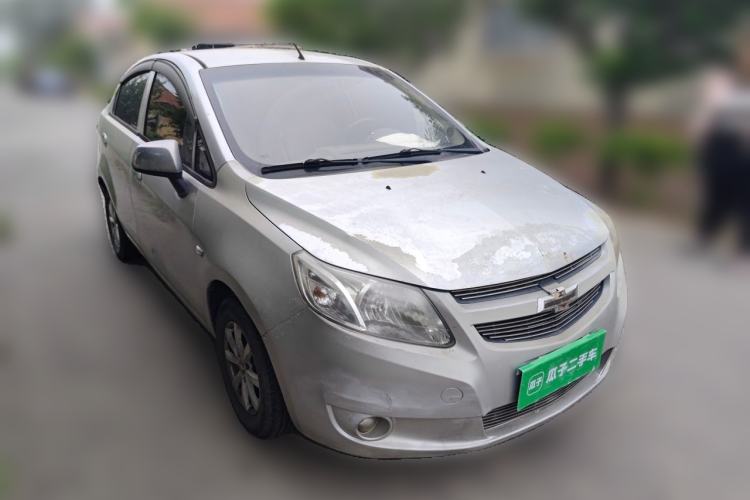 Used Chevrolet Sail 2013 Sedan 1.2L Manual Fashionable Happiness Edition Front Right 45 Deg