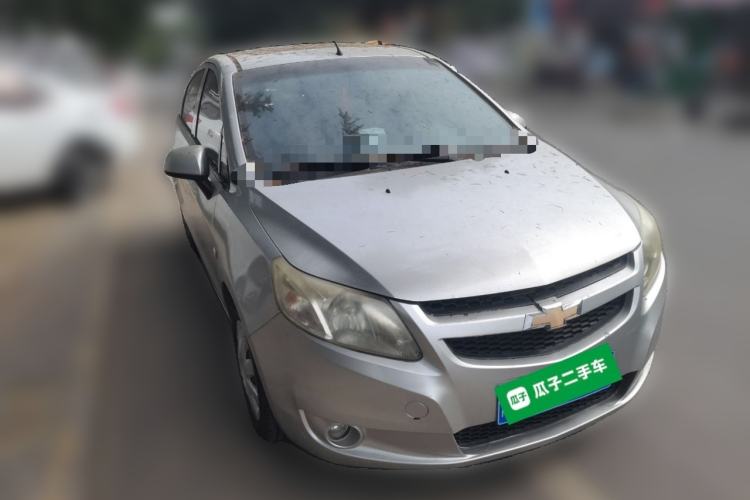 Used Chevrolet Sail 2013 Sedan 1.4L Manual Elegance Edition Front Right 45 Deg