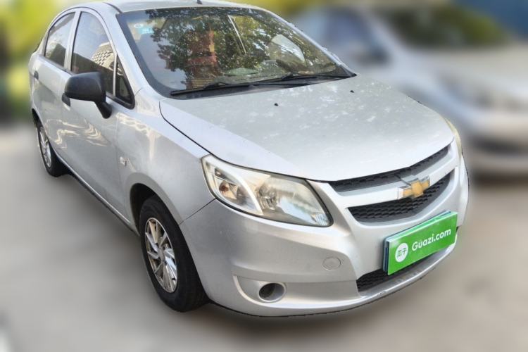 Used Chevrolet Sail 2013 Sedan 1.2L Manual Fashionable Happiness Edition Front Right 45 Deg