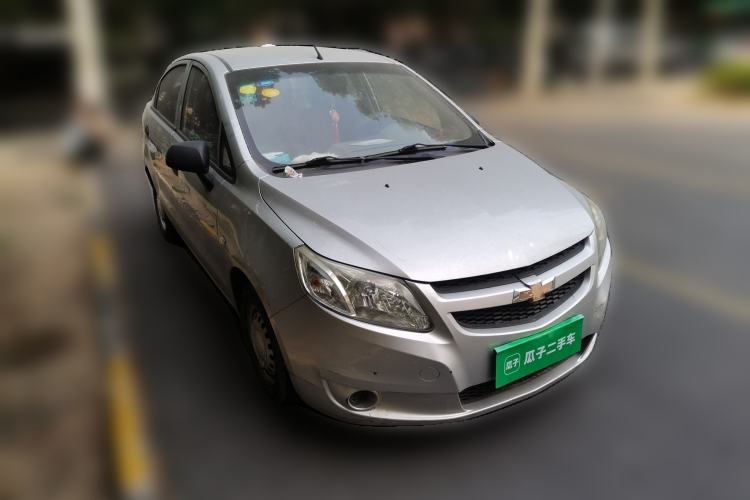 Used Chevrolet Sail 2013 Sedan 1.2L Manual Warm Edition Front Right 45 Deg