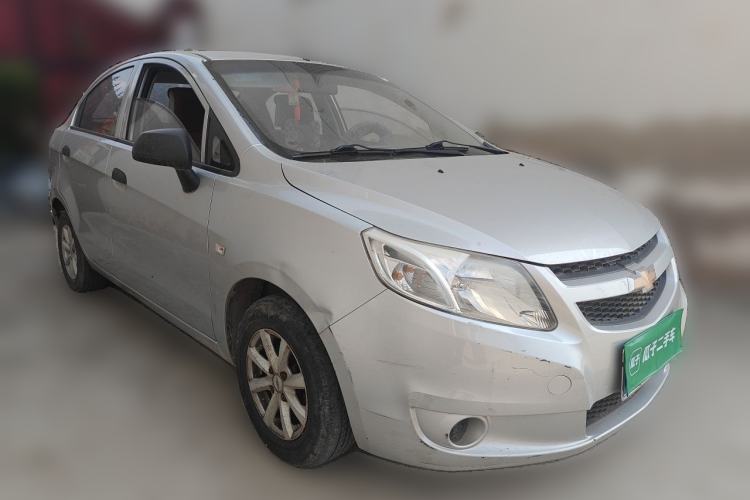 Used Chevrolet Sail 2013 Sedan 1.2L Manual Fashionable Happiness Edition Front Right 45 Deg