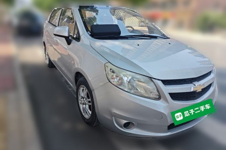Used Chevrolet Sail 2013 Sedan 1.4L Manual Happiness Edition II Front Right 45 Deg