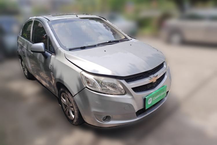 Used Chevrolet Sail 2013 Sedan 1.4L Manual - Youyi Happiness Edition Front Right 45 Deg