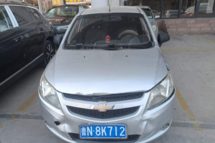 Used Chevrolet Sail 2013 Sedan 1.4L Manual Ideal Happiness Edition Front