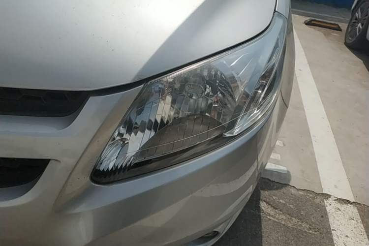 Used Chevrolet Sail 2013 Sedan 1.2L Manual Fashionable Happiness Edition Left Front Headlight