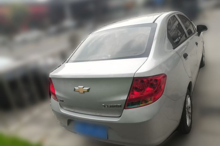 Used Chevrolet Sail 2013 Sedan 1.4L Manual Ideal Happiness Edition Rear
