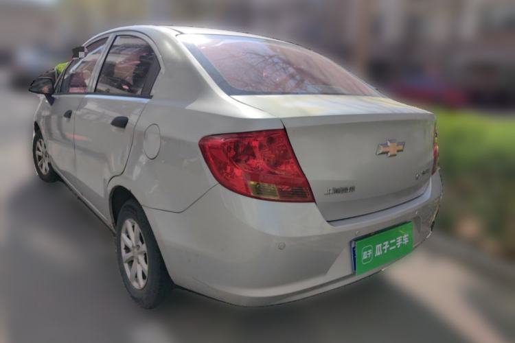 Used Chevrolet Sail 2013 Sedan 1.2L Manual Fashionable Happiness Edition Rear Left 45 Deg