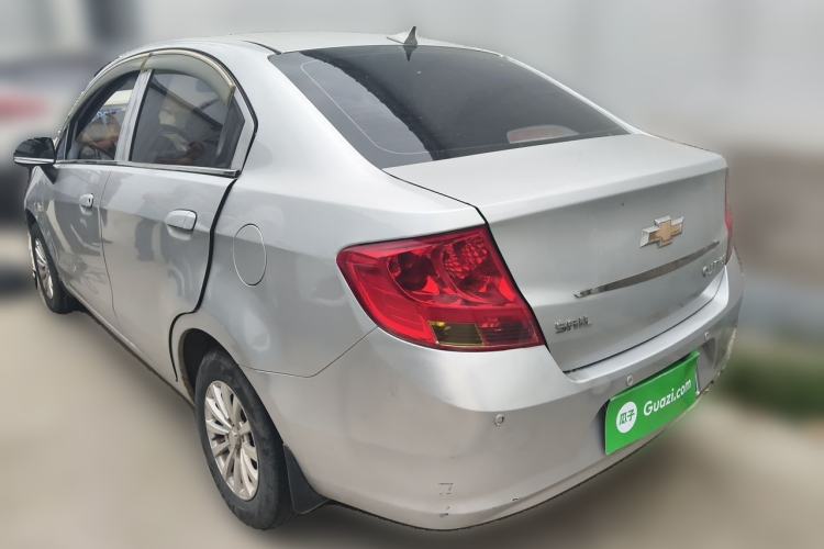 Used Chevrolet Sail 2013 Sedan 1.2L Manual Fashionable Happiness Edition Rear Left 45 Deg