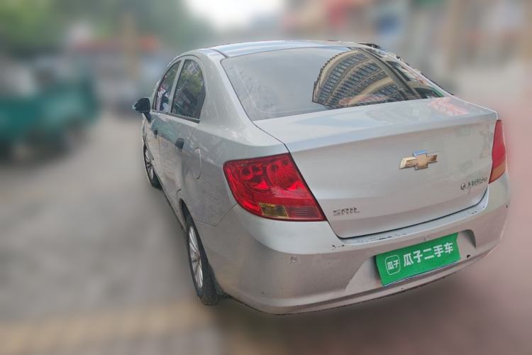 Used Chevrolet Sail 2013 Sedan 1.2L Manual Fashionable Happiness Edition Rear Left 45 Deg
