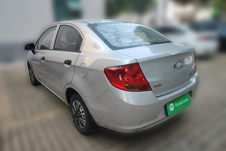Used Chevrolet Sail 2013 Sedan 1.2L Manual Fashionable Happiness Edition Rear Left 45 Deg