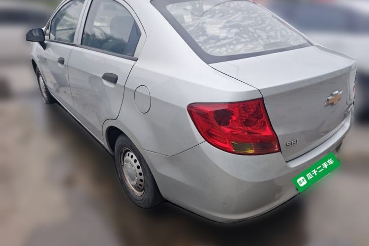 Used Chevrolet Sail 2013 Sedan 1.2L Manual Warm Edition Rear Left 45 Deg
