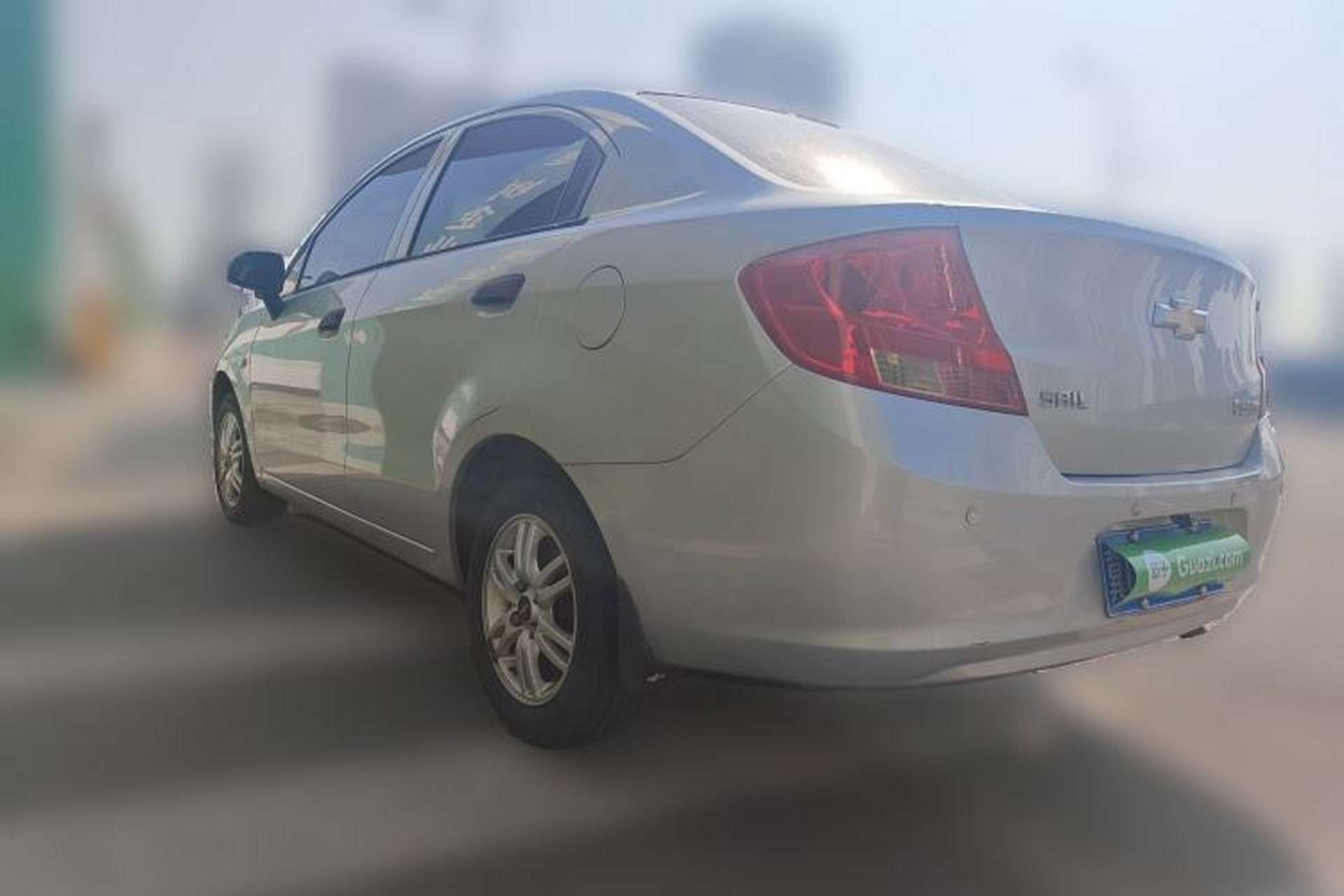Used Chevrolet Sail 2013 Sedan 1.4L Manual Ideal Happiness Edition Rear Left 45 Deg