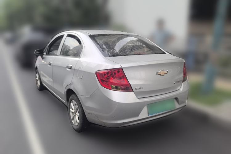 Used Chevrolet Sail 2013 Sedan 1.2L Manual Fashionable Happiness Edition Rear Left 45 Deg